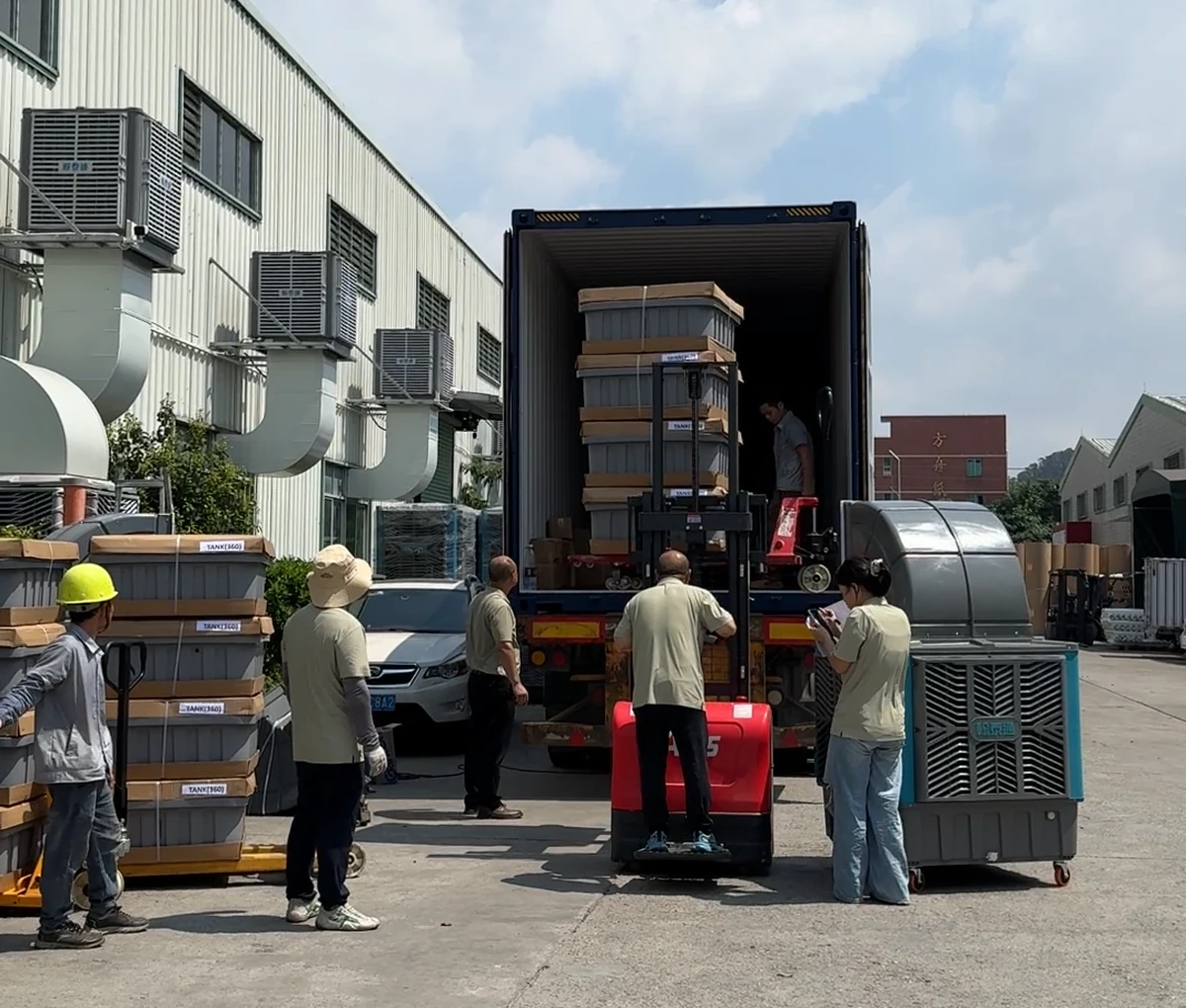 Hantaitong evaporative air coolers being loaded into an export container